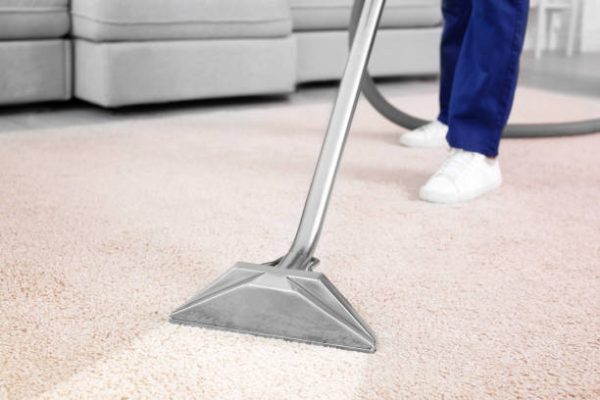 Eko Fresh Cleaning - Worker Removing Dirt from Carpet